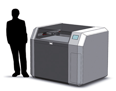 man standing beside German RepRap 3D Printer ( X1000) side view